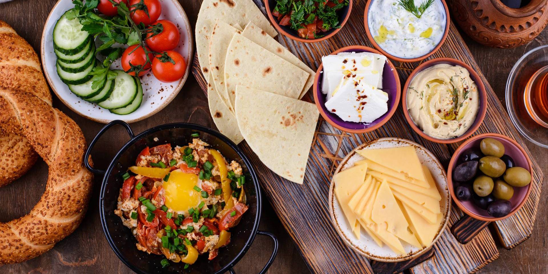 Traditional Turkish breakfast with meze and simit